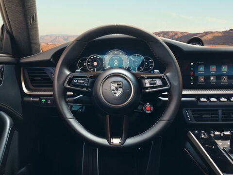 Lenkrad mit Porsche Logo in Turbonit